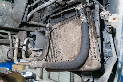 Замена масляного радиатора BMW